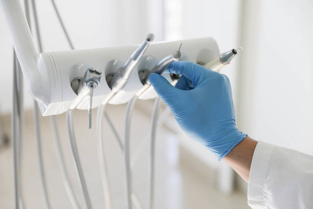 Professional Tooth Extraction technician working in Avimor, ID